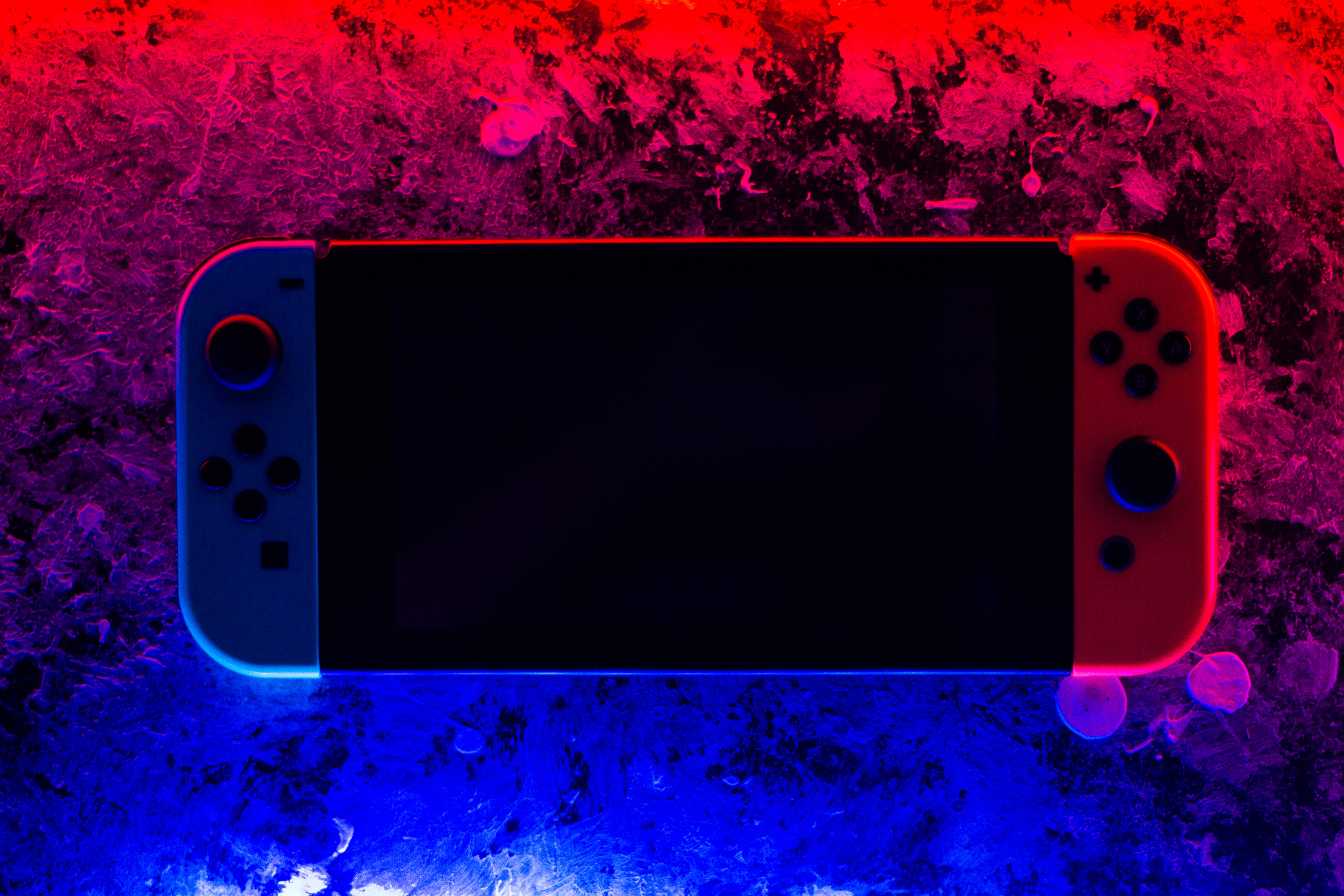 Game Console on a Red and Blue Background